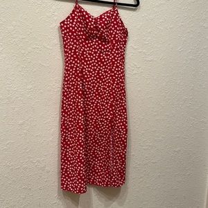 Red dress with flowers size small, goes just below the knee. Cute summer dress